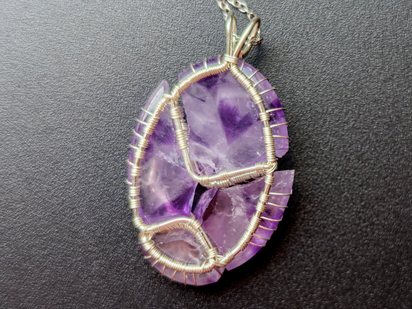Tree pendant with a broken amethyst gemstone