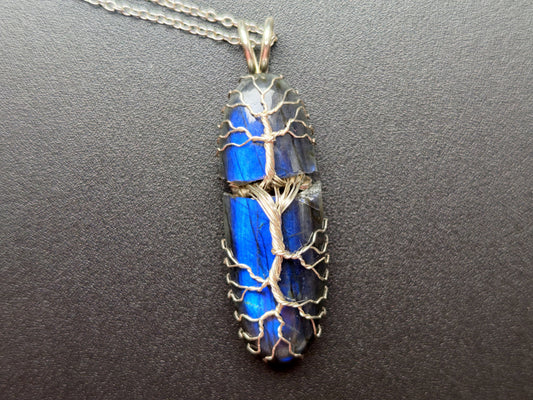 Tree pendant with a broken labradorite gemstone