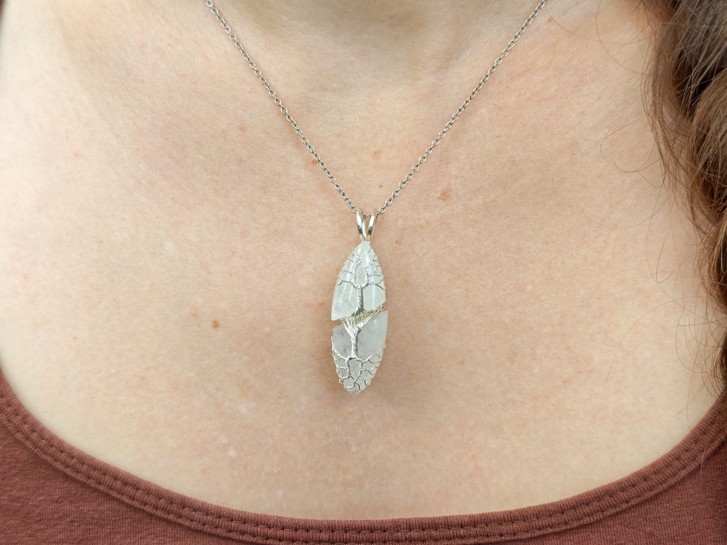 Tree pendant with a broken moonstone