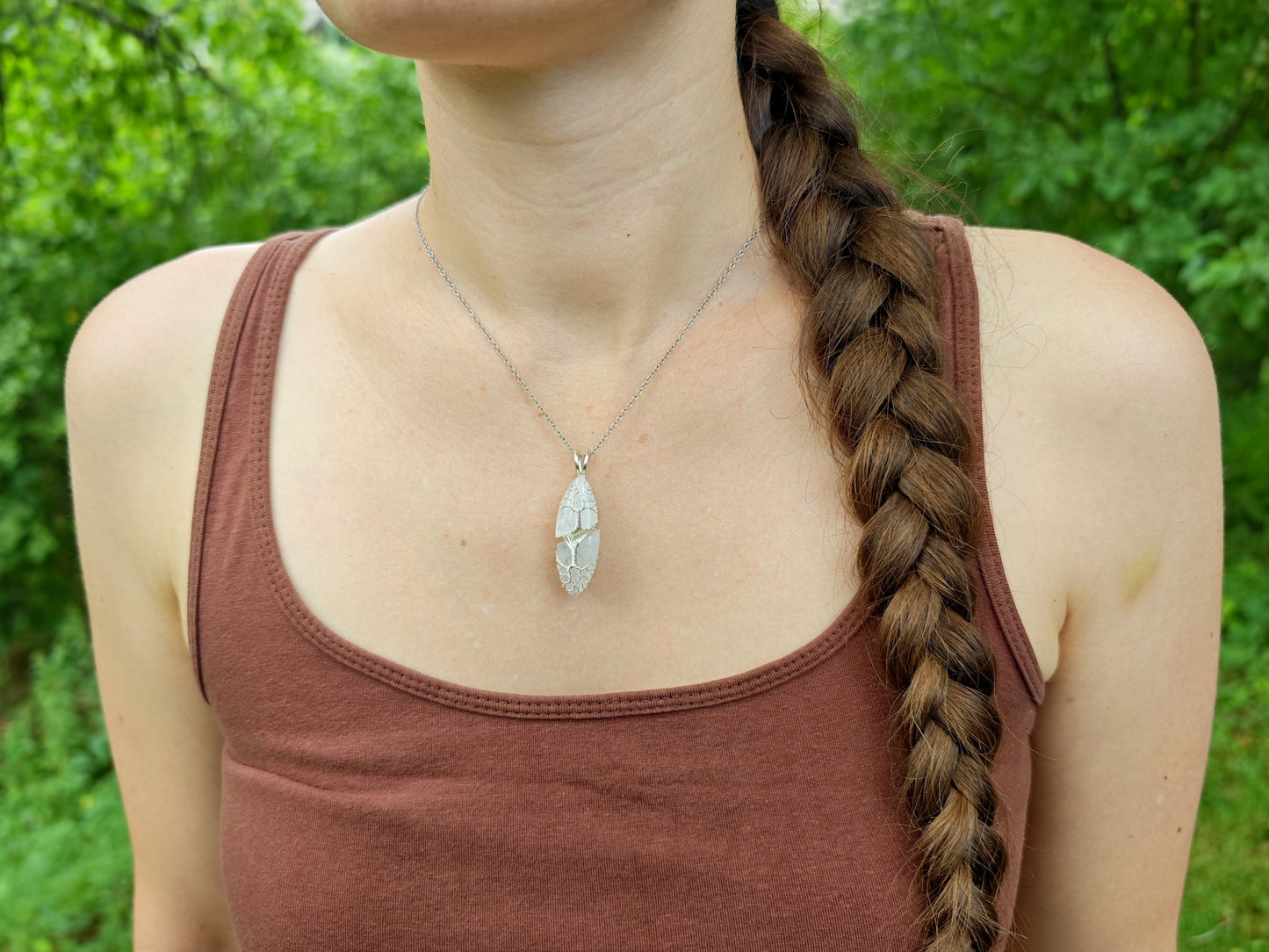 Tree pendant with a broken moonstone
