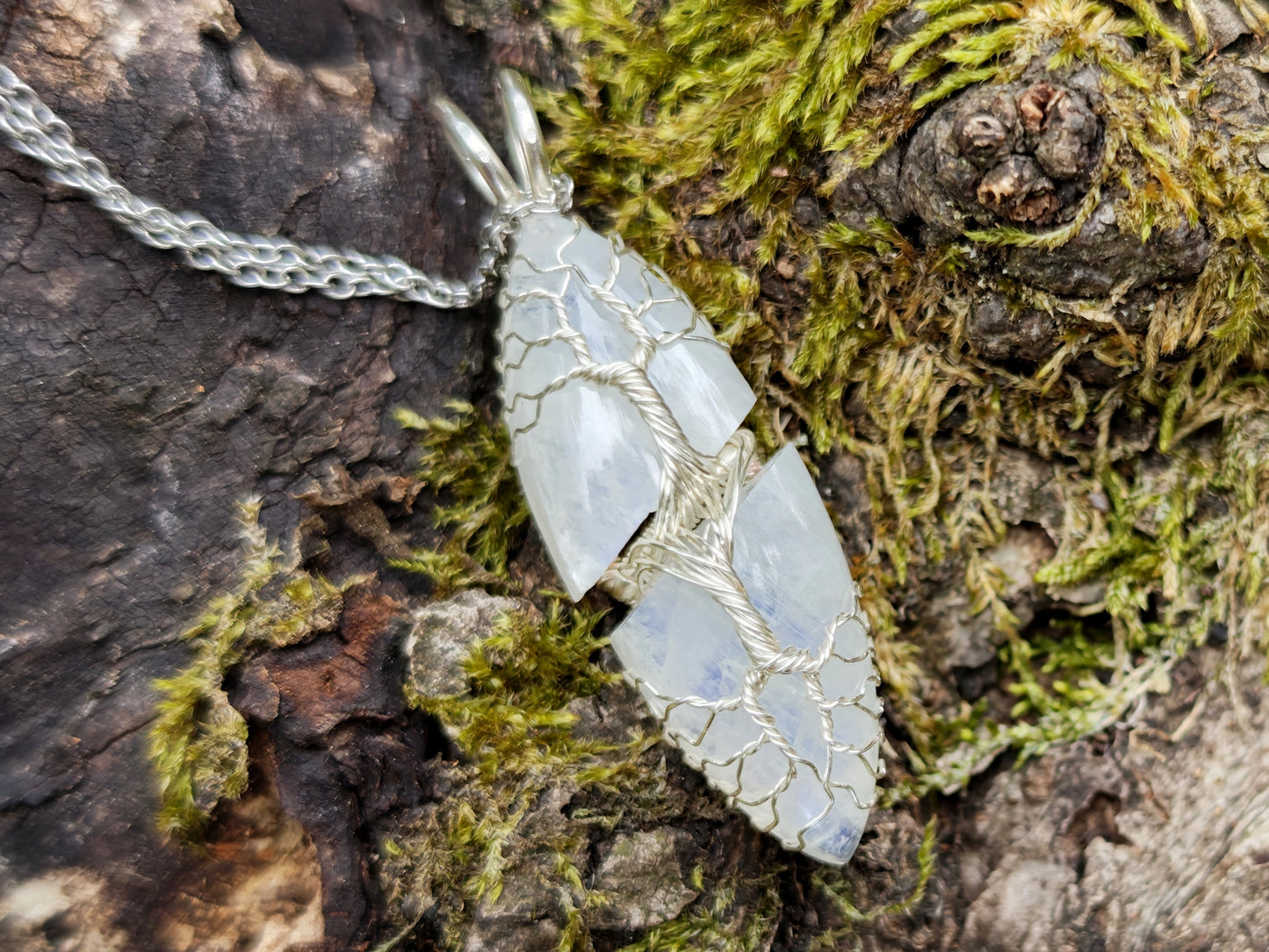Tree pendant with a broken moonstone