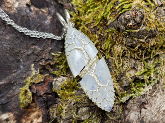 Tree pendant with a broken moonstone