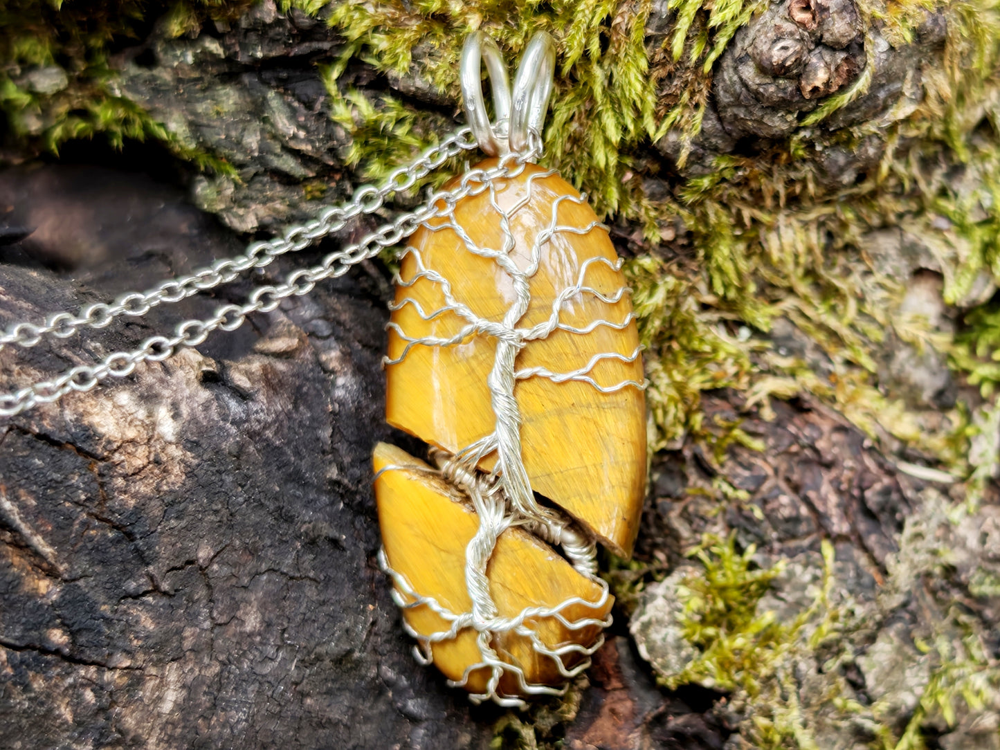 Tree pendant with a broken tiger's eye gemstone