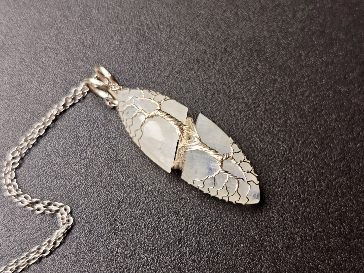 Tree pendant with a broken moonstone