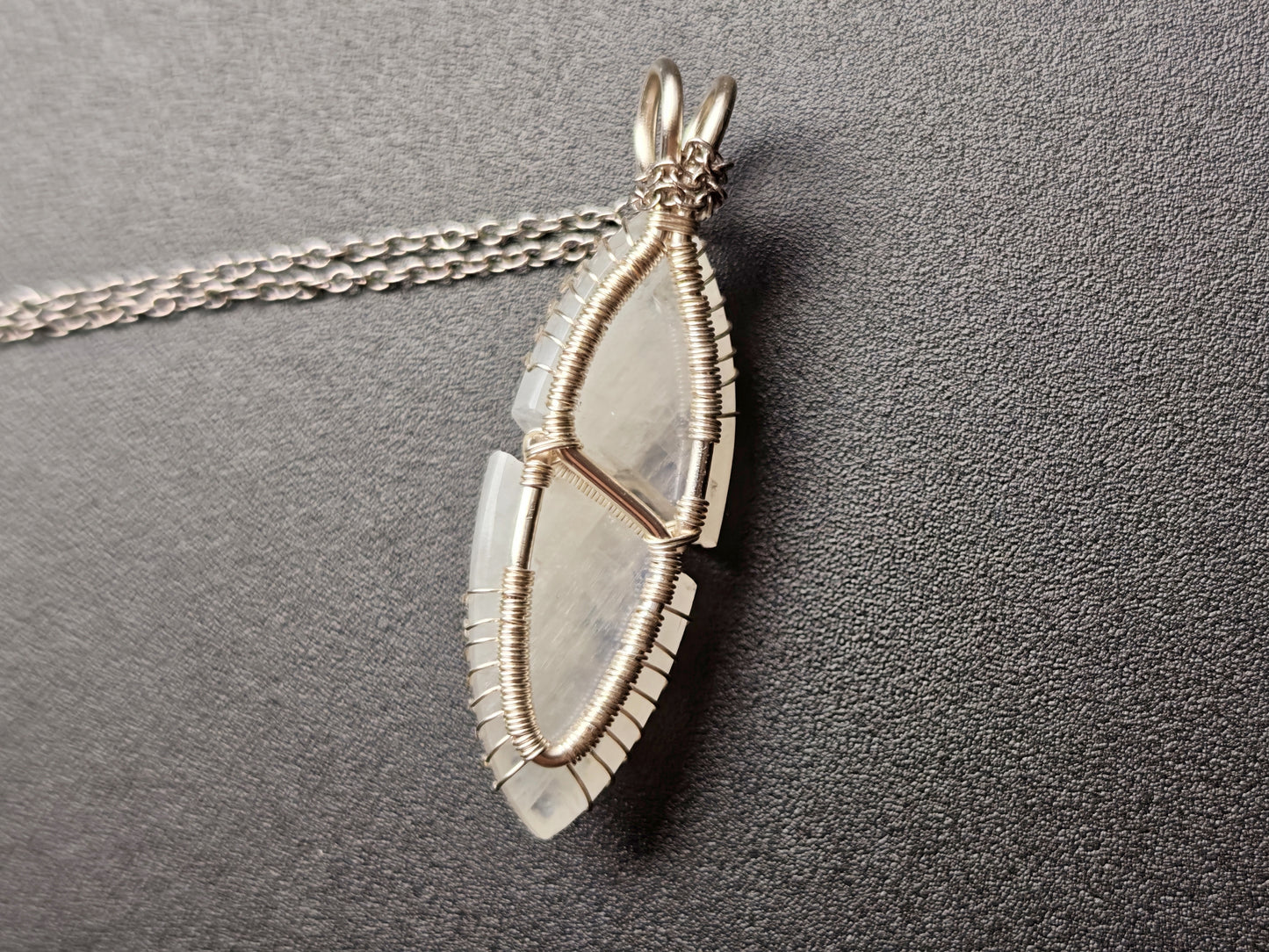 Tree pendant with a broken moonstone