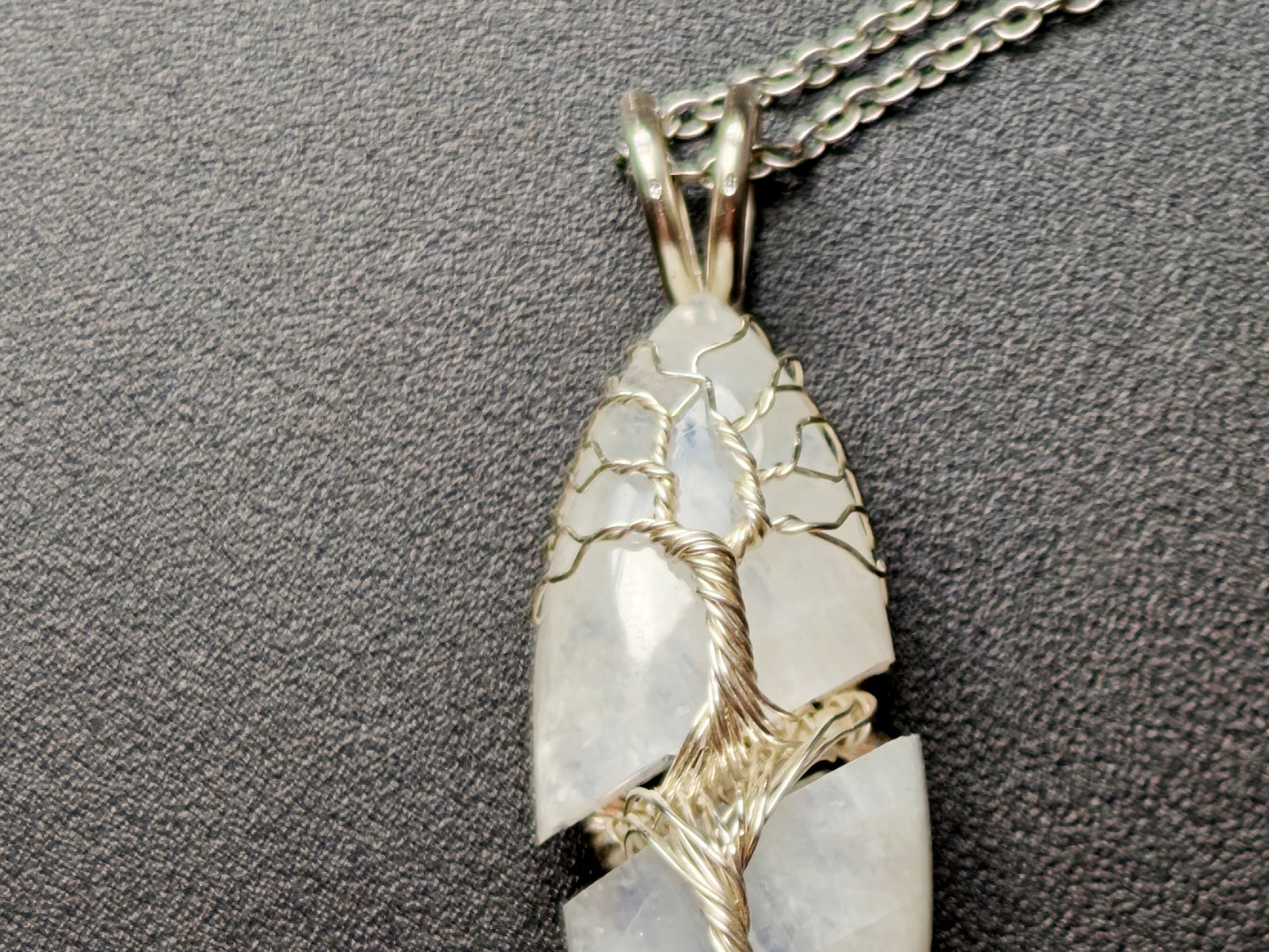 Tree pendant with a broken moonstone