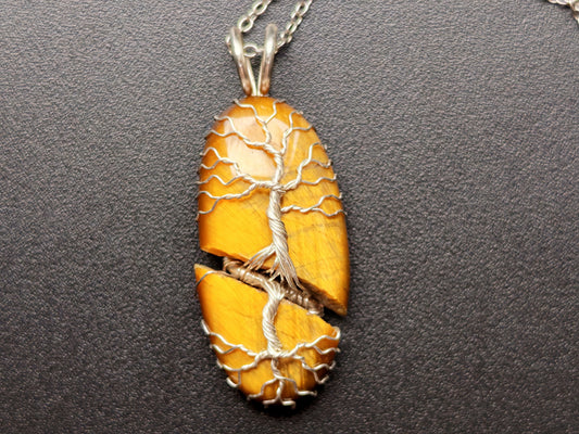 Tree pendant with a broken tiger's eye gemstone