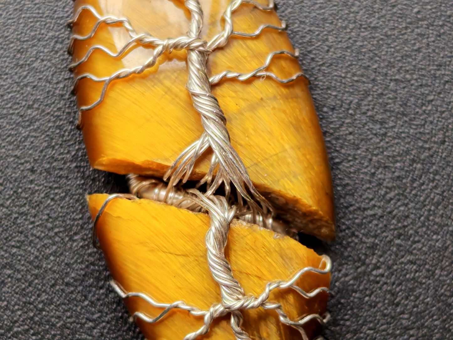 Tree pendant with a broken tiger's eye gemstone