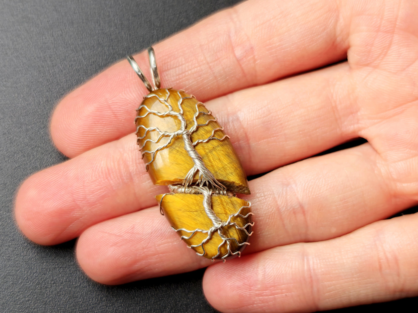 Tree pendant with a broken tiger's eye gemstone
