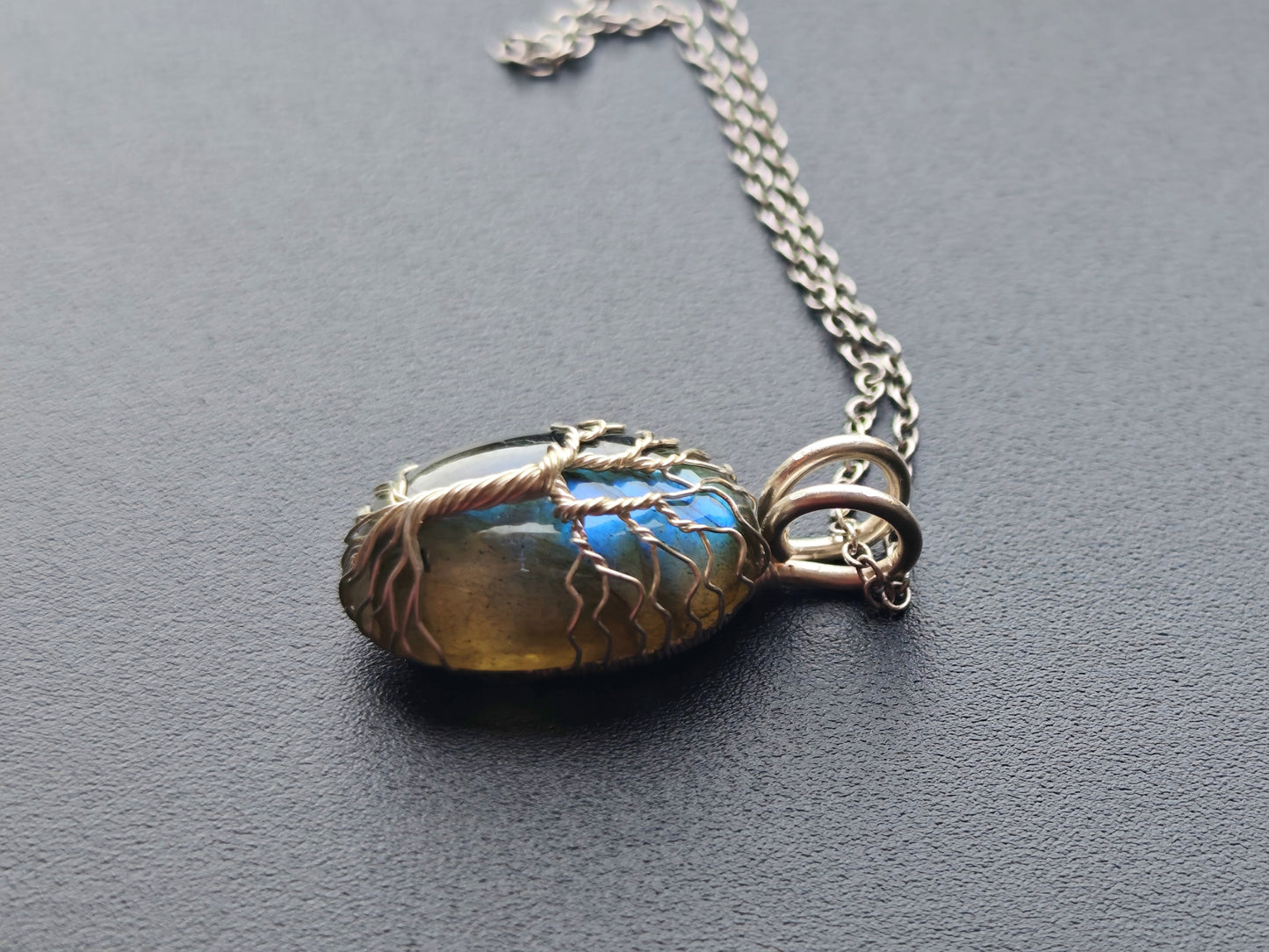 Tree pendant with a labradorite gemstone