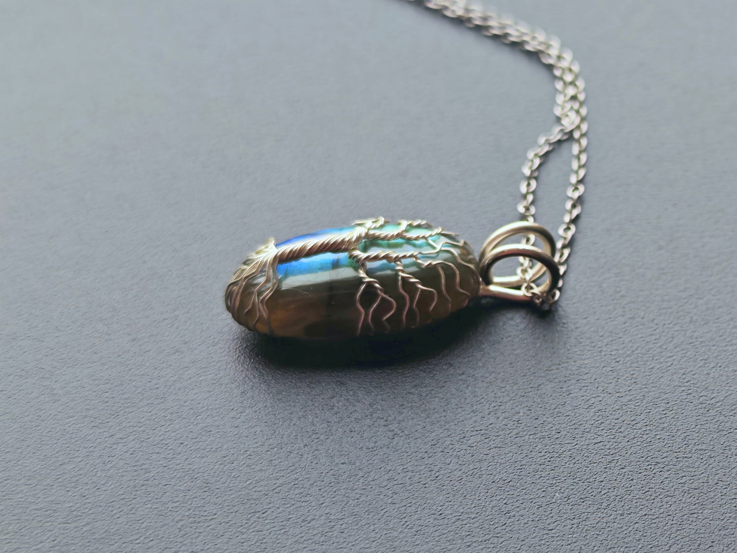 Tree pendant with a labradorite gemstone