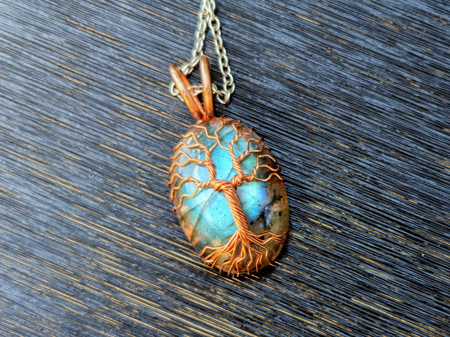 Tree pendant with a labradorite gemstone