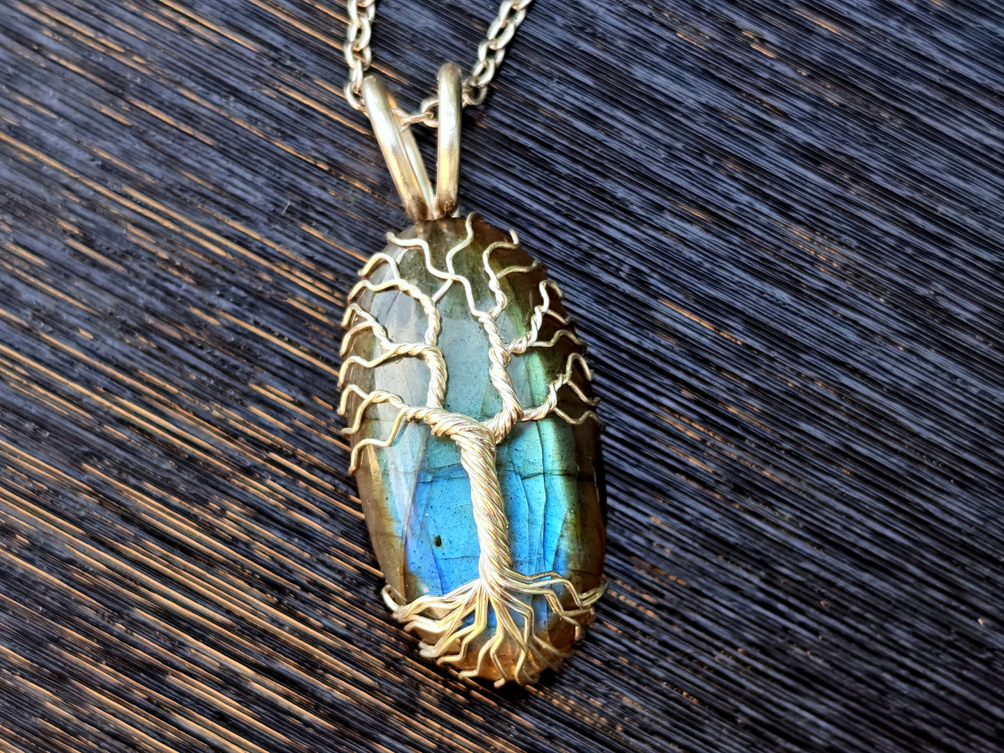 Tree pendant with a labradorite gemstone