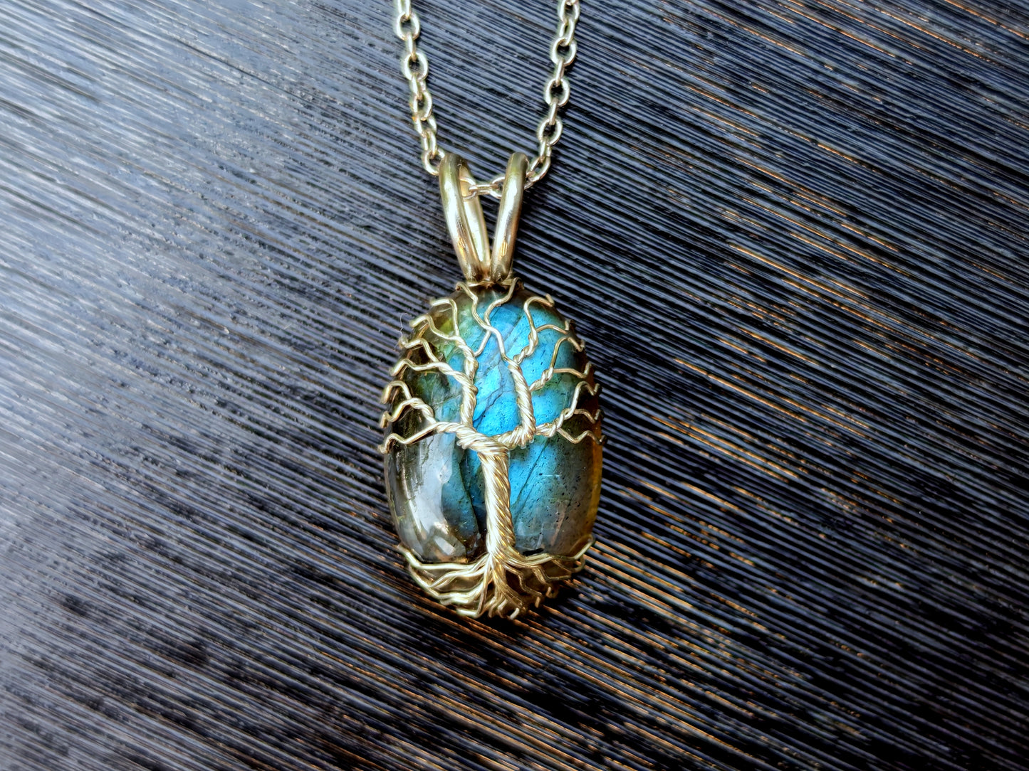 Tree pendant with a labradorite gemstone