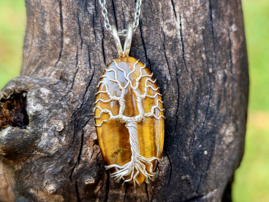 Tree pendant with a tiger's eye gemstone