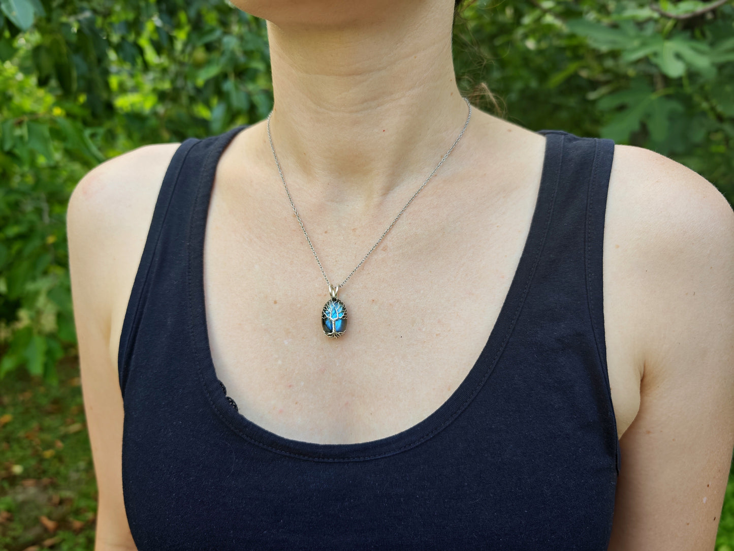 Tree pendant with a labradorite gemstone