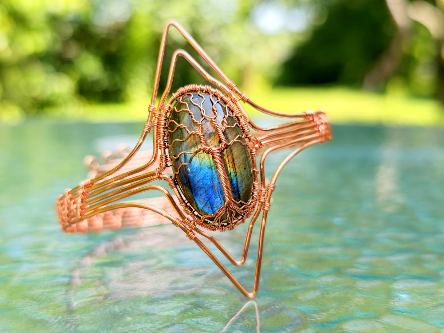 Tree arm ring with a labradorite gemstone