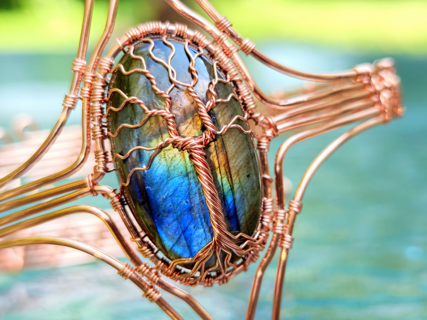 Tree arm ring with a labradorite gemstone