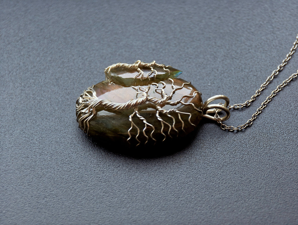 Tree pendant with a broken labradorite gemstone