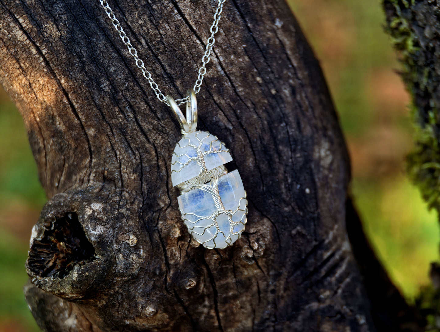 Tree pendant with a broken moonstone gemstone