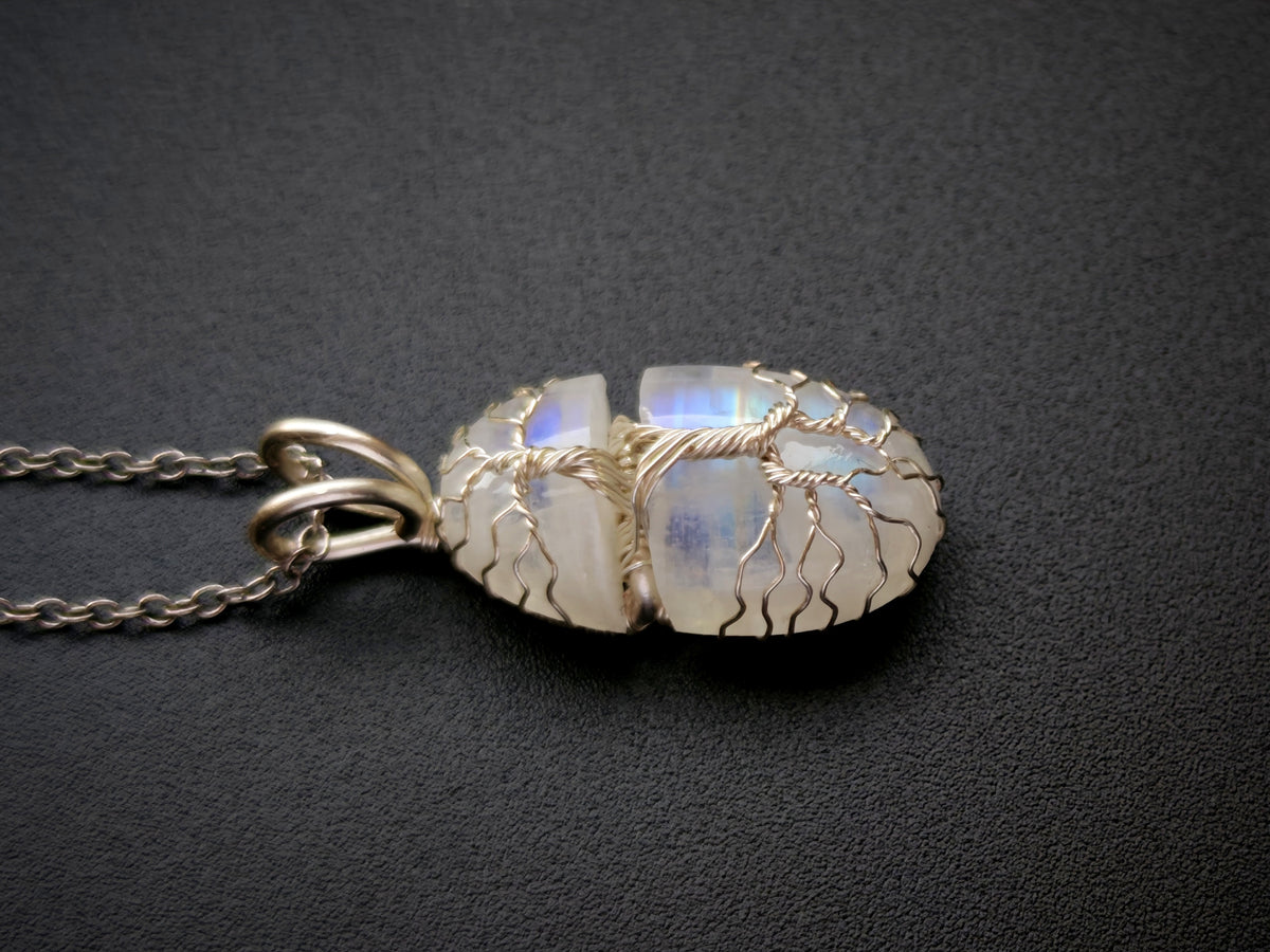 Tree pendant with a broken moonstone gemstone