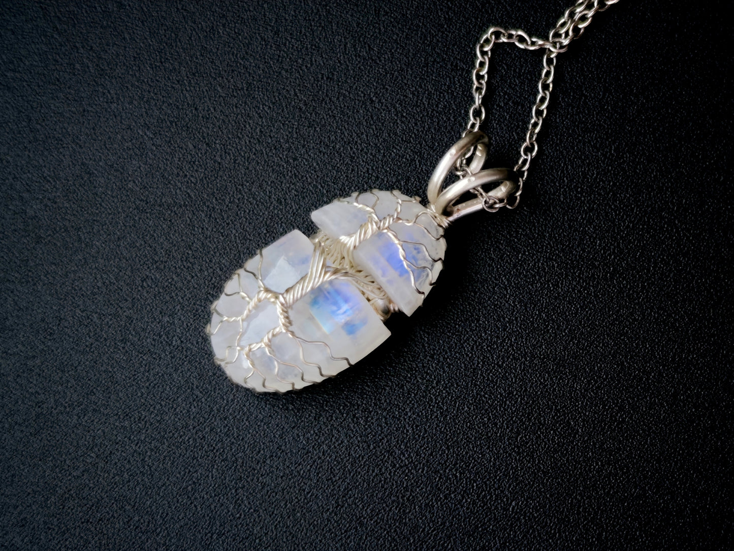 Tree pendant with a broken moonstone gemstone