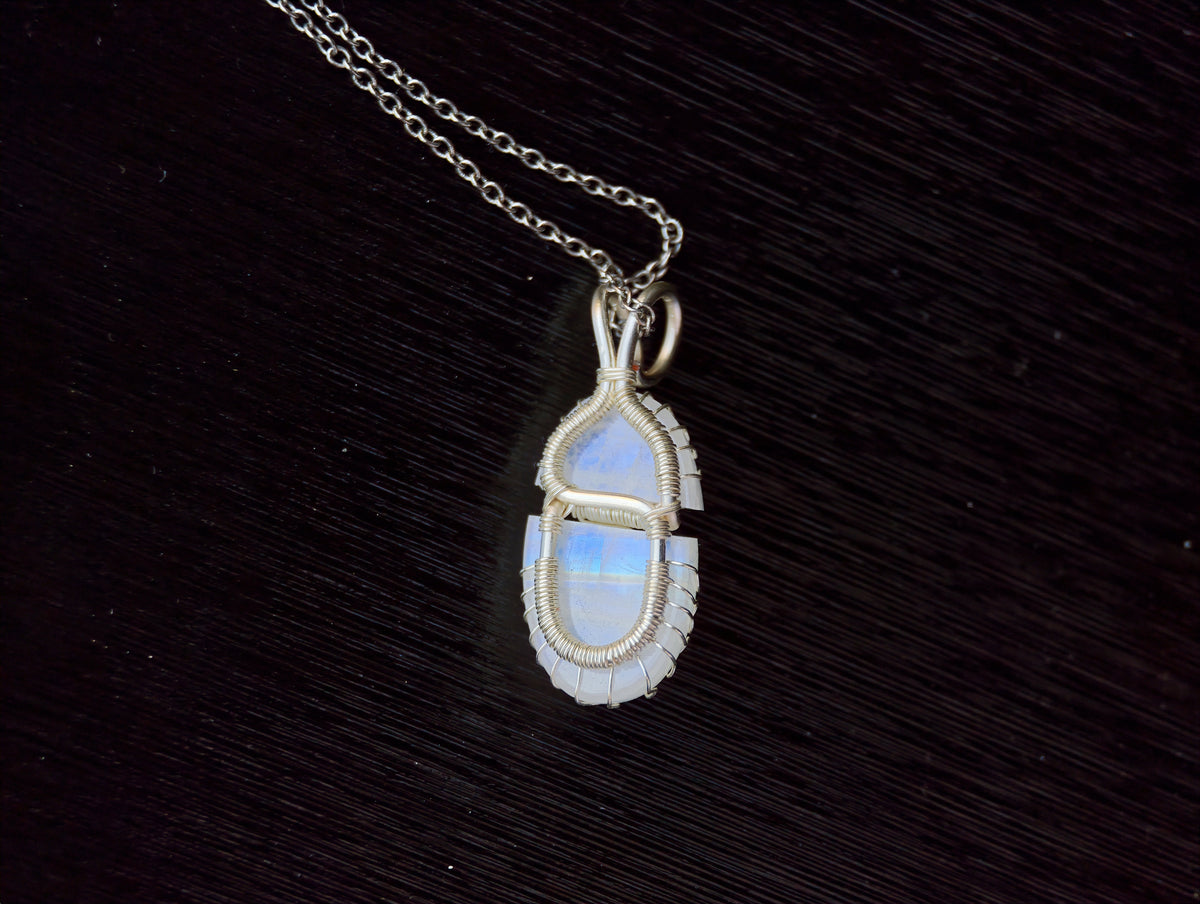 Tree pendant with a broken moonstone gemstone