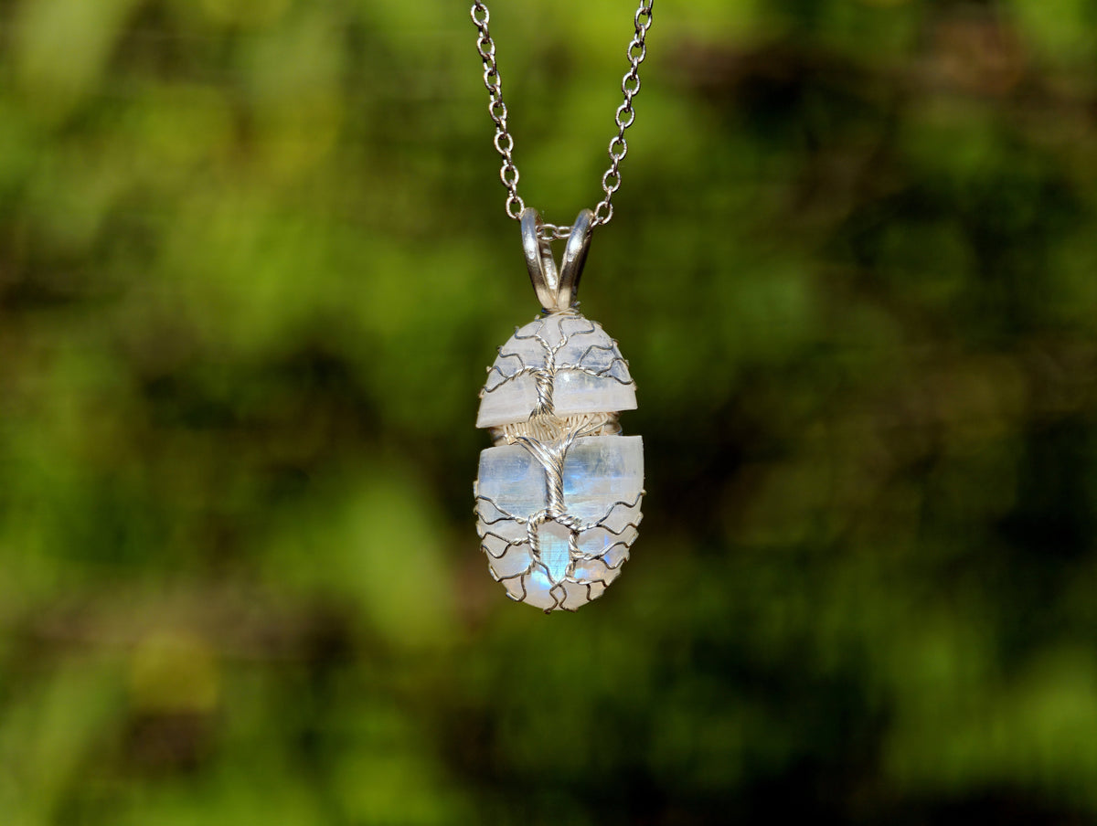 Tree pendant with a broken moonstone gemstone