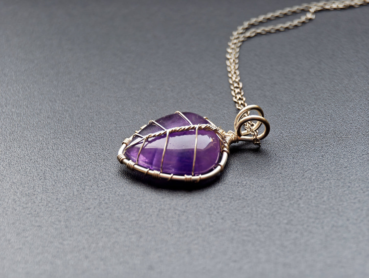 Leaf pendant with an amethyst gemstone