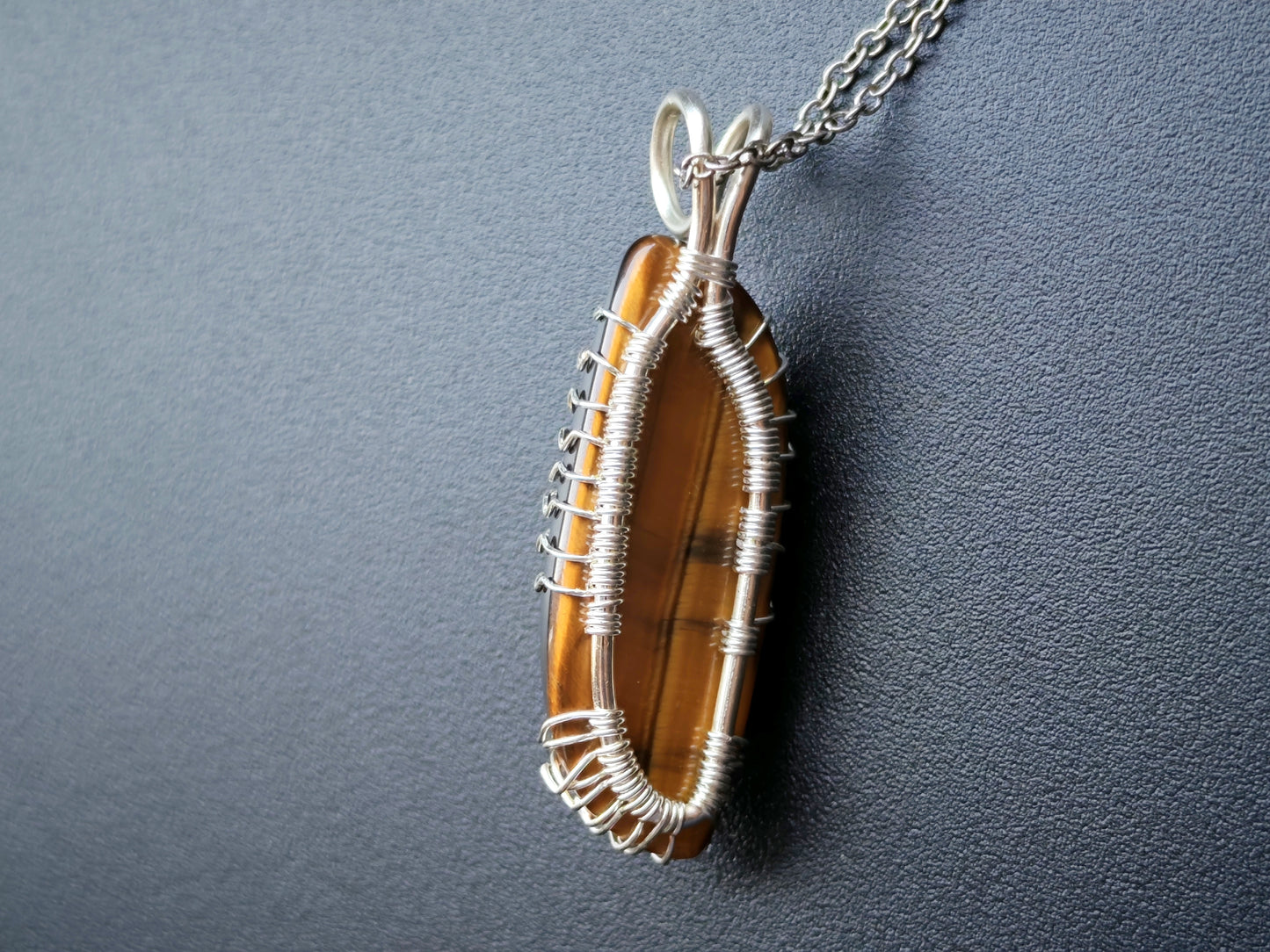 Tree pendant with a tiger's eye gemstone