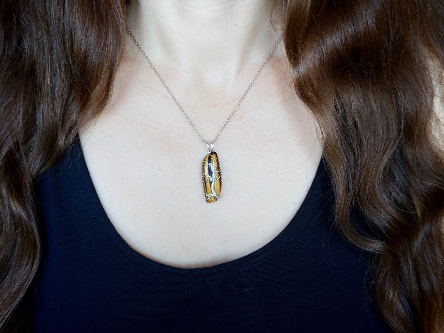 Tree pendant with a tiger's eye gemstone