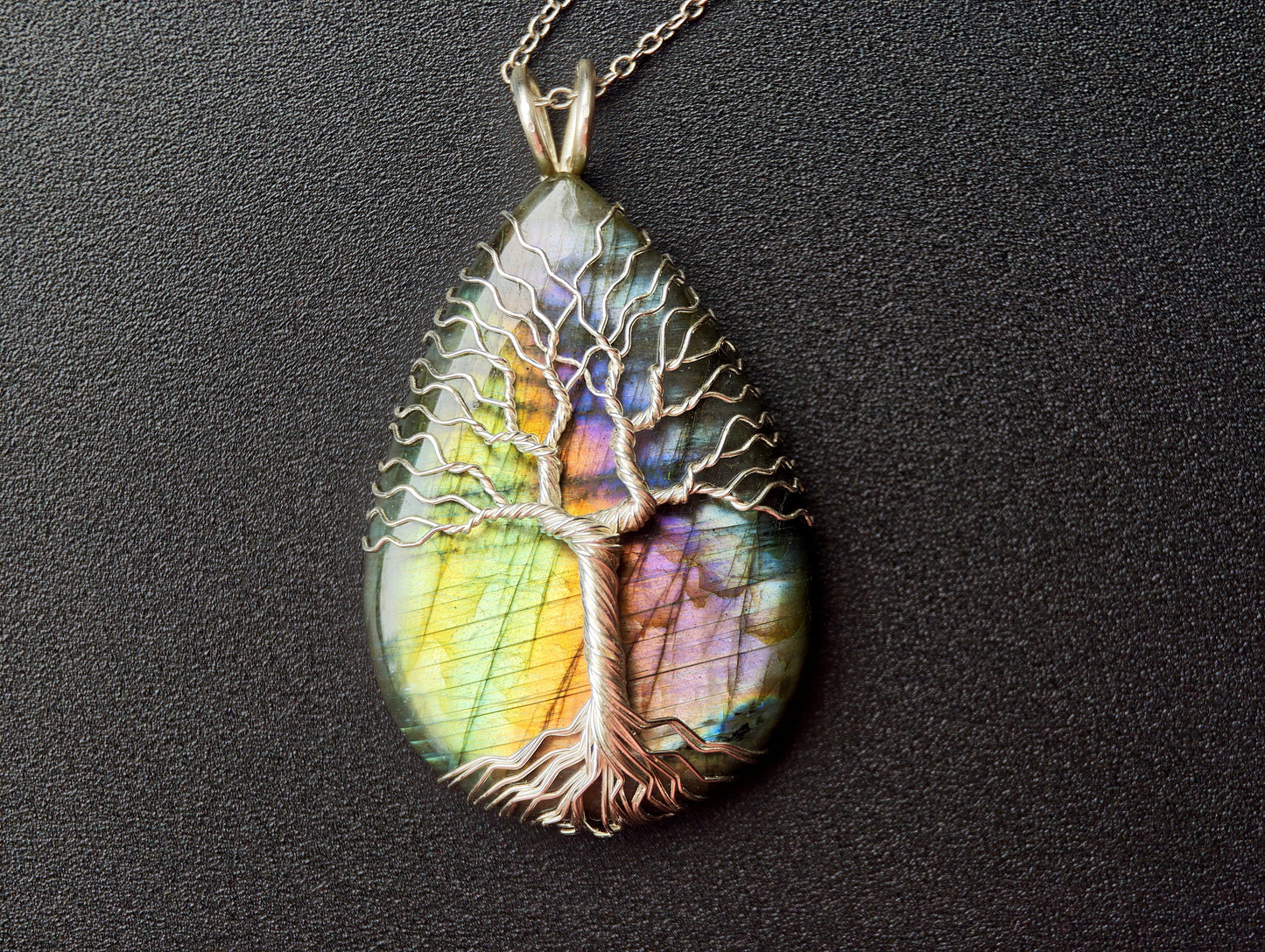 Tree pendant with a labradorite gemstone