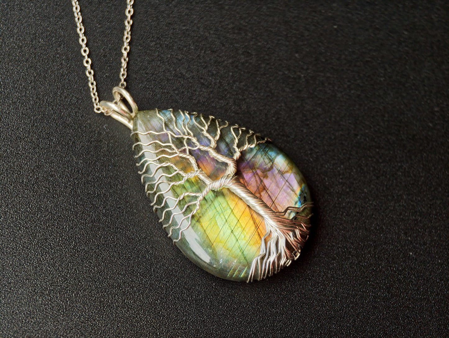 Tree pendant with a labradorite gemstone