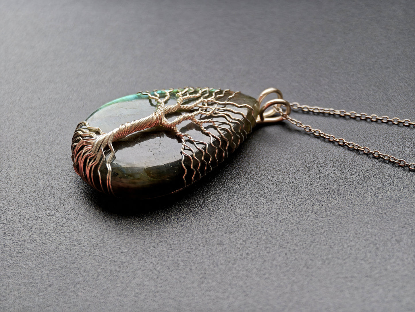 Tree pendant with a labradorite gemstone