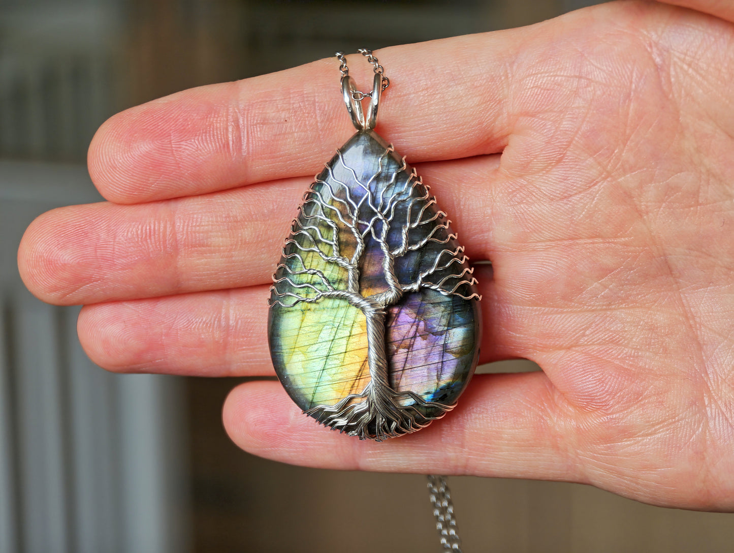 Tree pendant with a labradorite gemstone