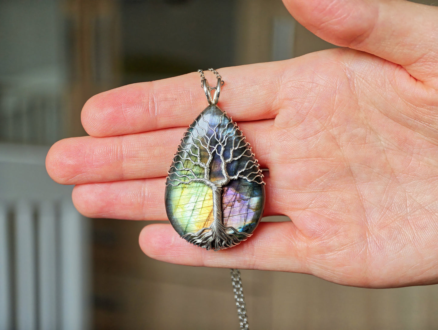 Tree pendant with a labradorite gemstone