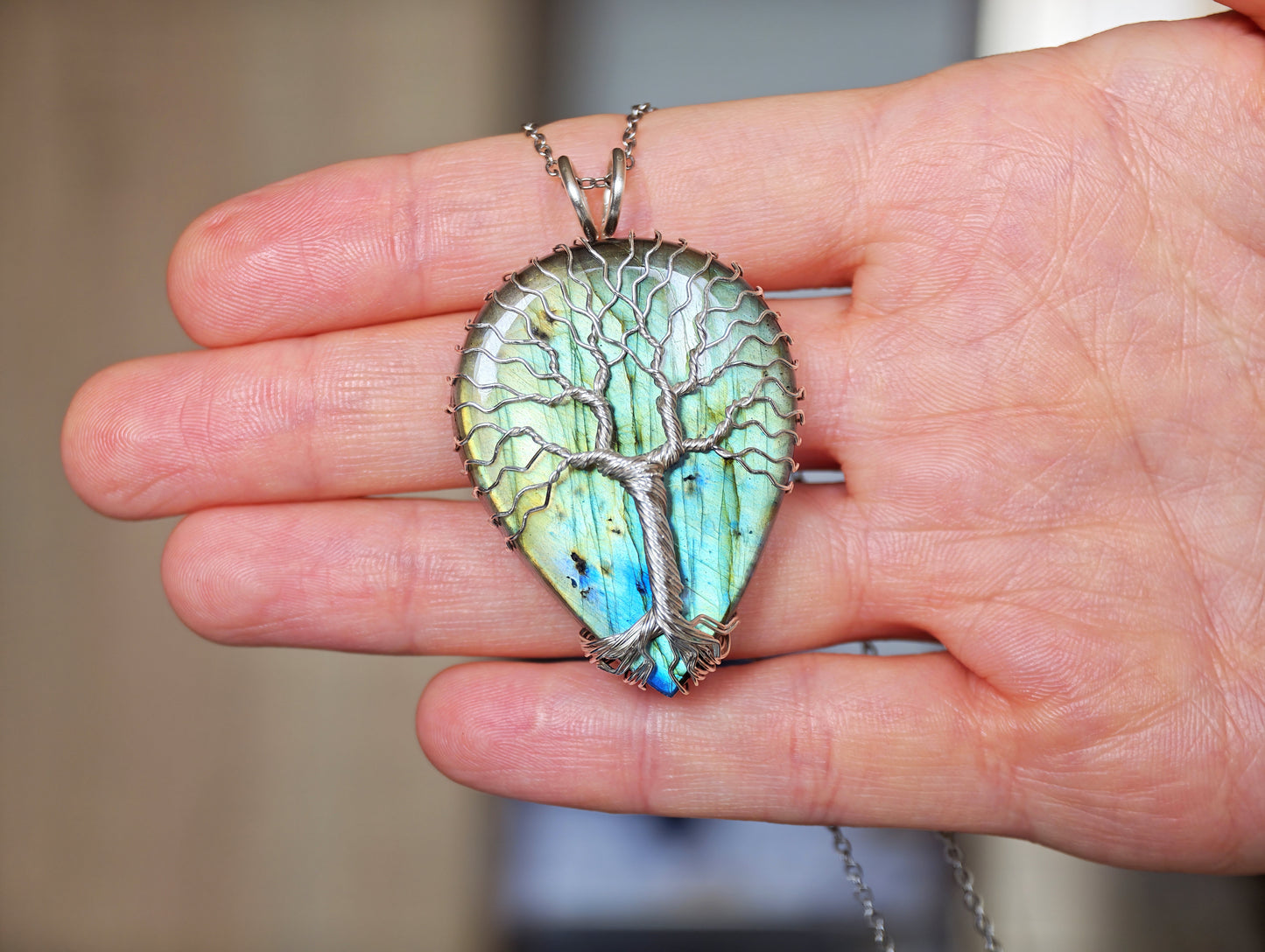 Tree pendant with a labradorite gemstone