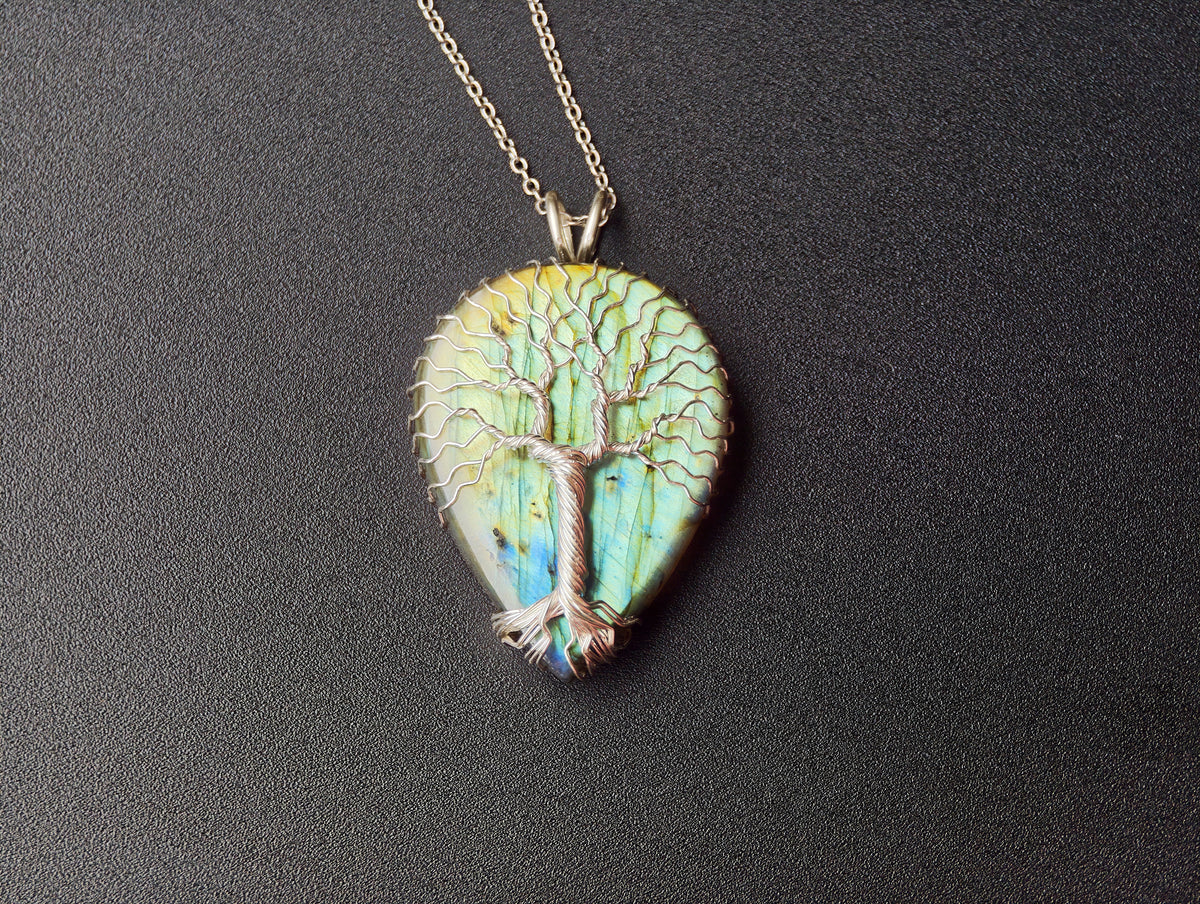 Tree pendant with a labradorite gemstone