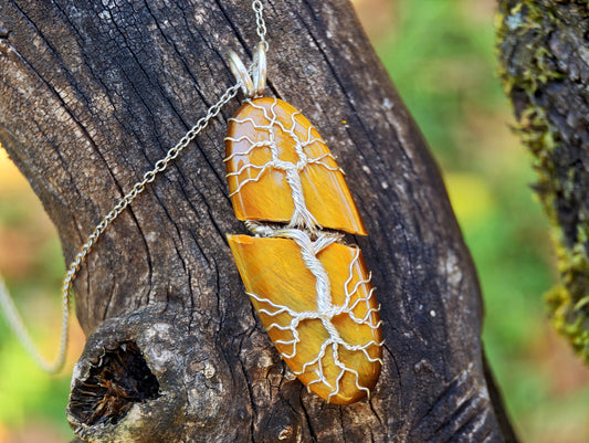 Tree pendant with a broken tiger's eye gemstone