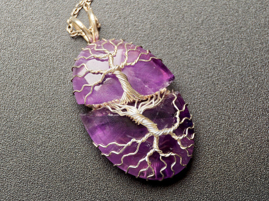 Tree pendant with a broken amethyst gemstone