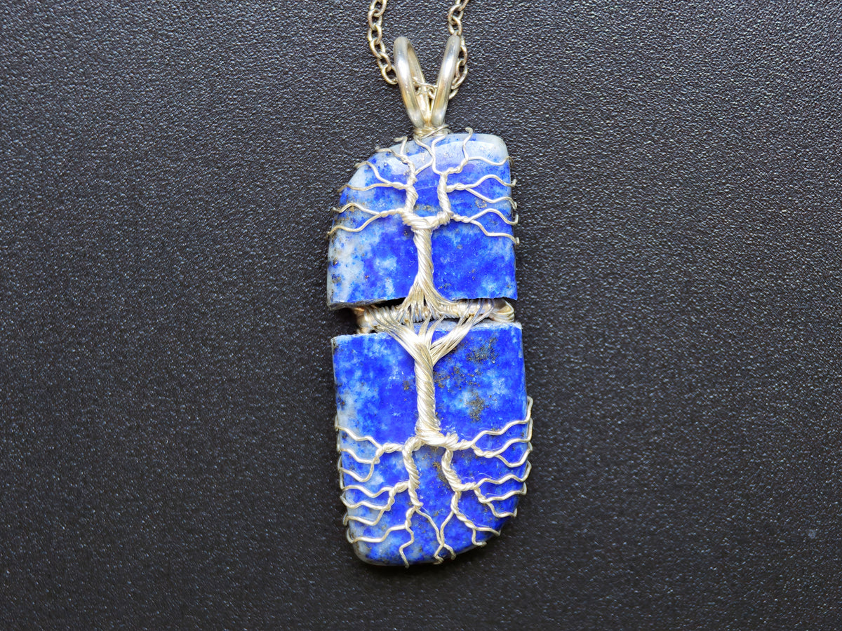 Tree pendant with a broken lapis lazuli gemstone