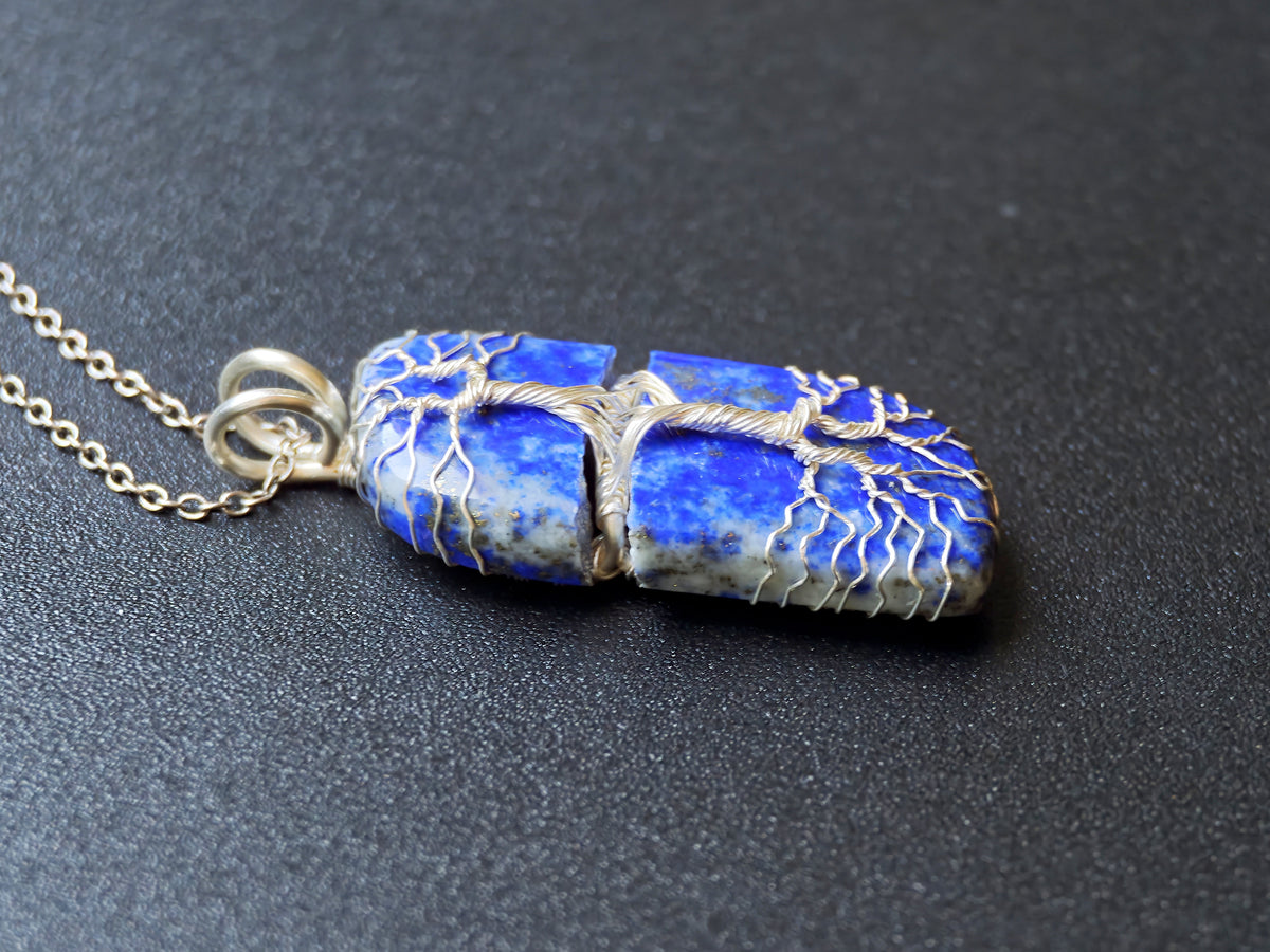 Tree pendant with a broken lapis lazuli gemstone