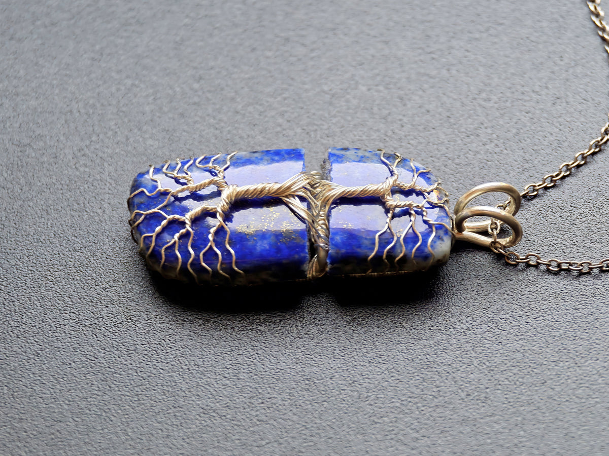Tree pendant with a broken lapis lazuli gemstone