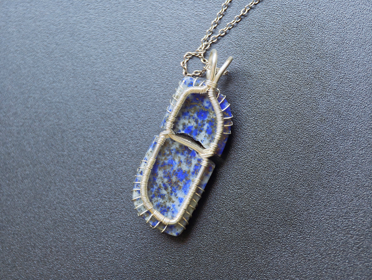 Tree pendant with a broken lapis lazuli gemstone