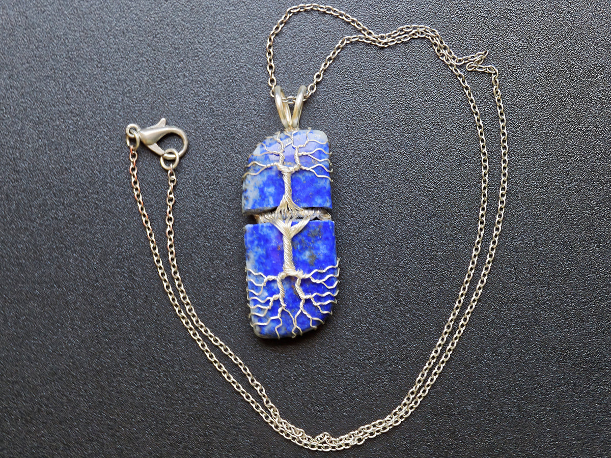Tree pendant with a broken lapis lazuli gemstone