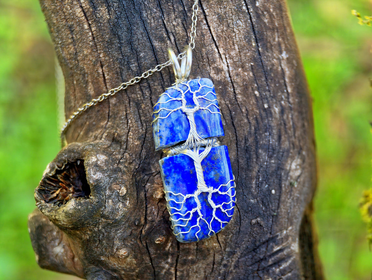 Tree pendant with a broken lapis lazuli gemstone