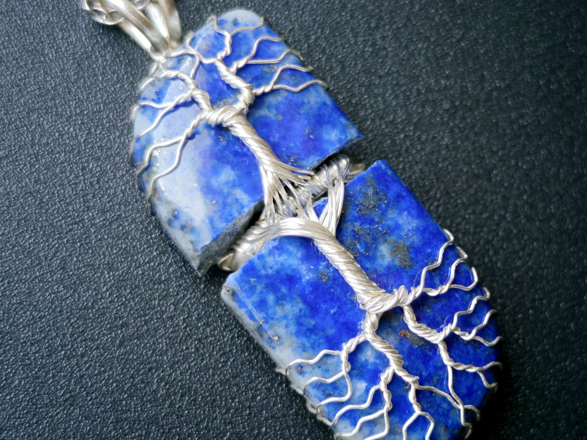 Tree pendant with a broken lapis lazuli gemstone