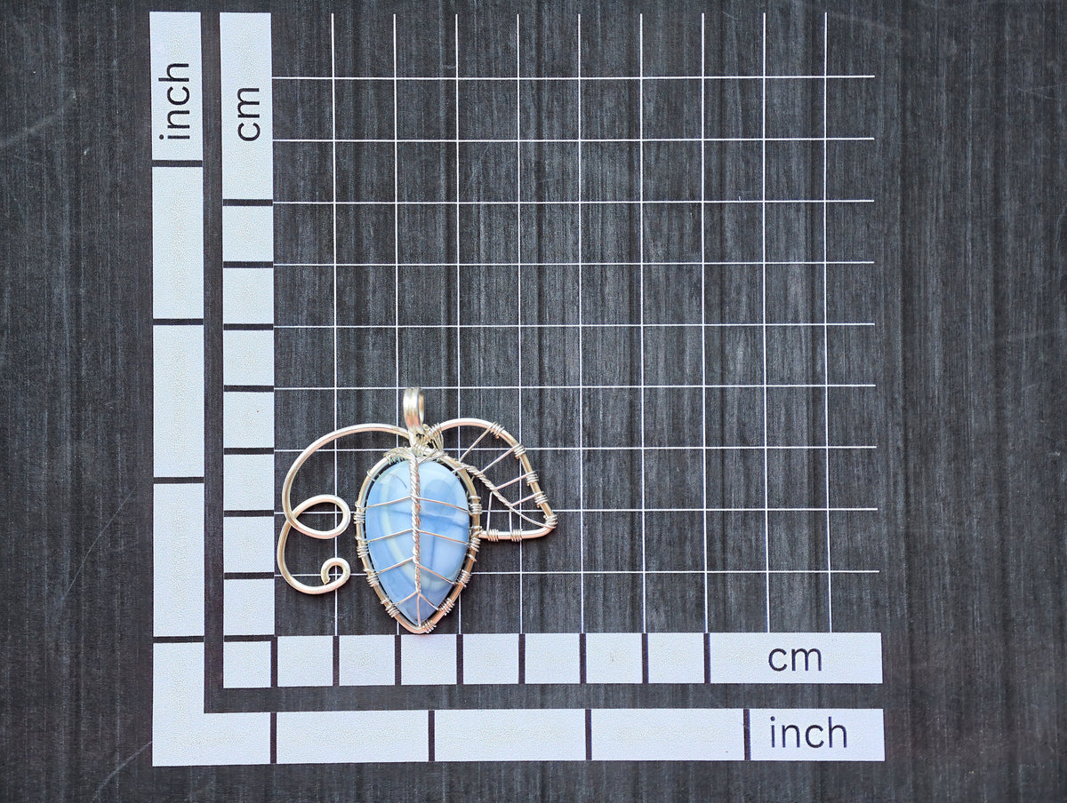 Leaf pendant with a blue opal gemstone