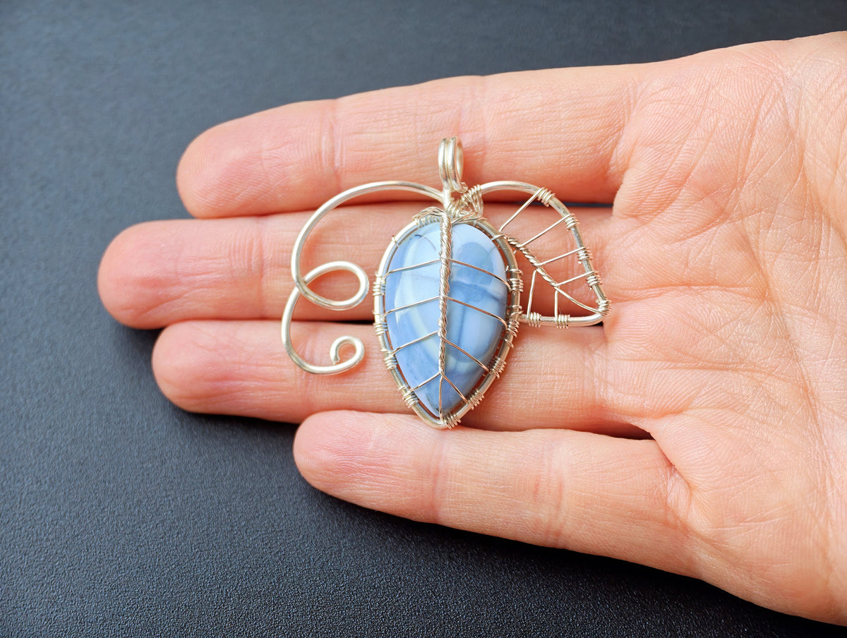 Leaf pendant with a blue opal gemstone