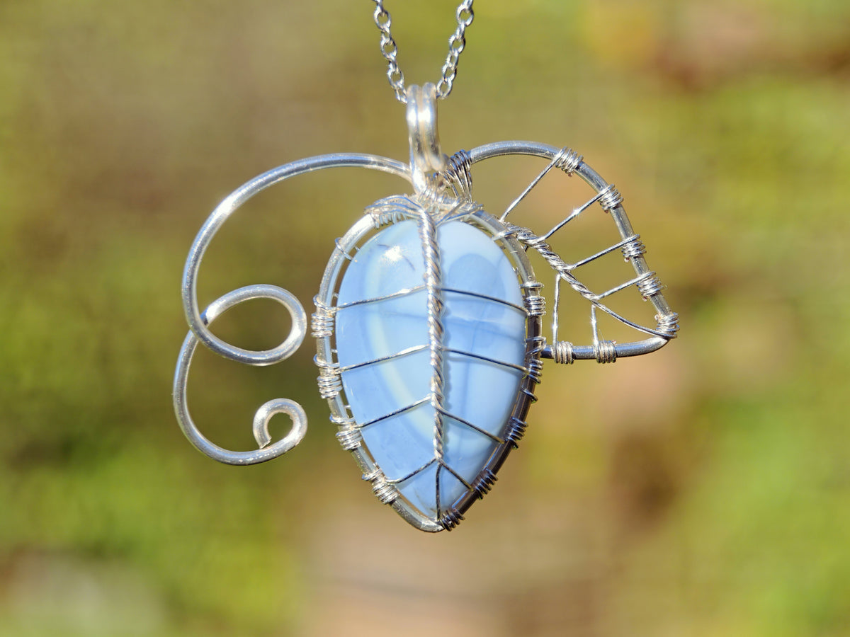 Leaf pendant with a blue opal gemstone